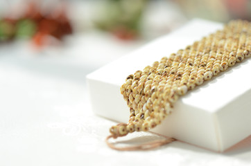 Handmade beaded bracelet with leather closure close up