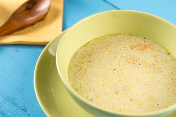 Homemade domestic soup with vegetables and meat in the bowl