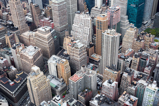 NEW YORK CITY - OCTOBER 9, 2014: Close Up Of Facade And Roofs Of The Buildings Below Empire State Building