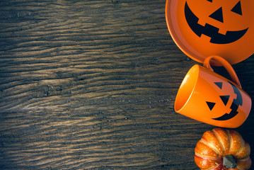 halloween and pumpkin dish and coffee mug cup on wood table