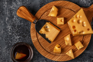 Cheese on cutting board.