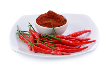 Cayenne pepper in white bowl isolated on white background