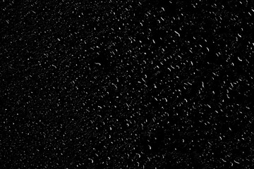 Water droplets on black background and texture