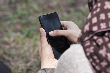 People are using smartphones, selective focus