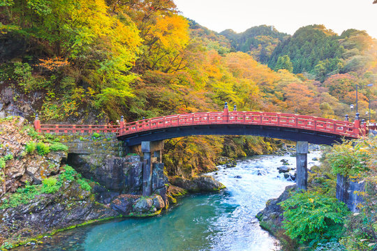 Nikko red Shinkyo bridge in autumn season.