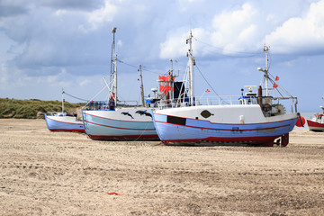Naklejka na ściany i meble Fishing boats on the shore