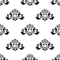 Black ornaments on white seamless background