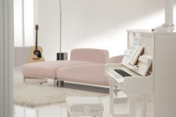 white piano in the white lounge