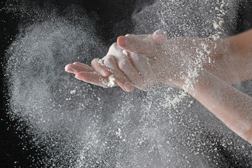 Fototapeta premium Hands in flour