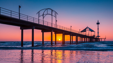 Brighton Beach jetty at sunset - obrazy, fototapety, plakaty