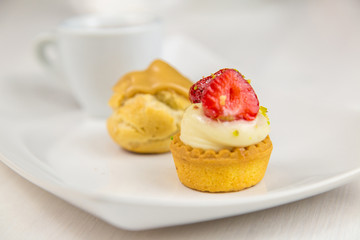 Sicilian pastry and coffee on white dish