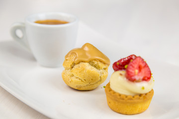 Sicilian pastry and coffee on white dish