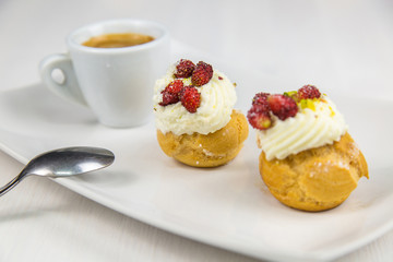 Sicilian pastry and coffee on white dish