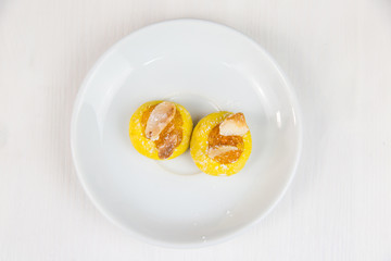 Sicilian pastry on white circular dish