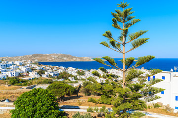 View of Mykonos island coast with white houses, Greece