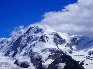 Fototapeta na wymiar Lyskamm at Monte Rosa massif, landscape of swiss alpine mountain range in Switzerland