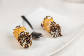 Sicilian pastry on white rectangular dish