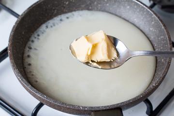 Preparing bechamel sauce boiling butter
