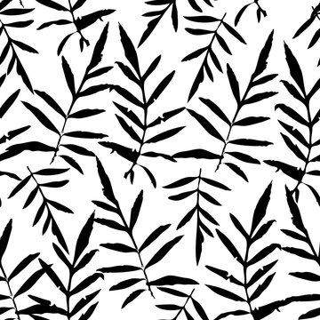 Seamless pattern with leafs tropical fern palm for fashion textile or web background. Black  silhouette on white background. Vector