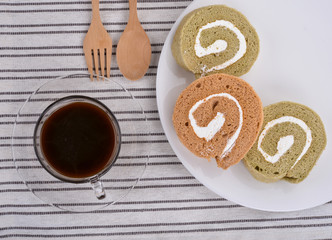 Jam roll with coffee