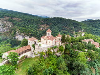 AERIAL. Old monastery hiding in the forests, also known as Motsameta, Georgia