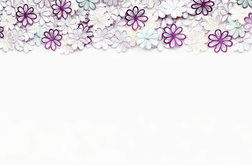 Embroidery colorful flowers pattern texture and background on a white background for Wedding invitation or greeting card.