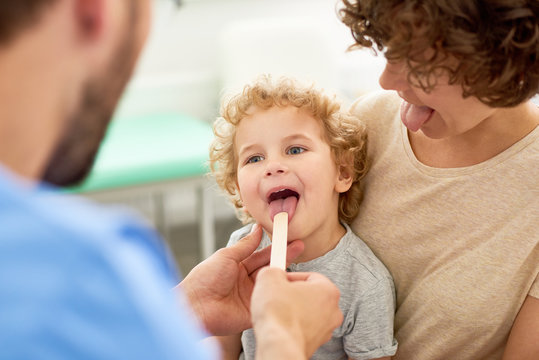 Pediatrician Examining Child