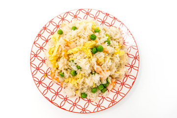 Homemade Chinese fried rice with vegetables and fried eggs