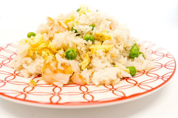 Homemade Chinese fried rice with vegetables and fried eggs