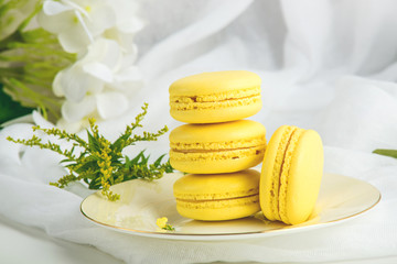 Obraz na płótnie Canvas Yellow banana macarons. French delicate dessert for Breakfast