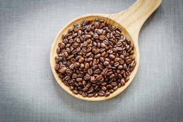 coffee bean on wooden plate