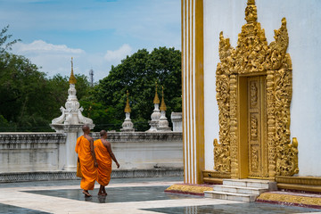 Buddhist monks walking at Mandalay Eindawya Paya