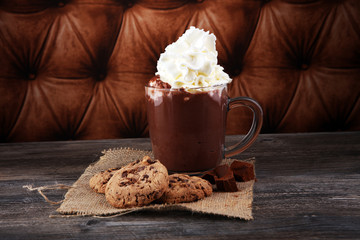 hot chocolate with cocoa and chocolate chip cookies.