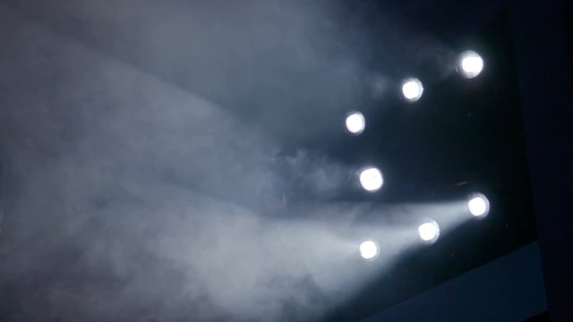 Lighting equipment on the stage. The spotlight through the smoke. Theater performance. Footage clip 4K