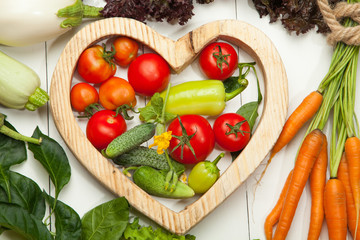 Fresh vegetables on a white background. Diet, a healthy lifestyle.