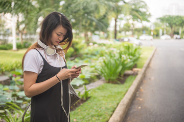 Close-up of young girl waiting for taxi