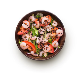 Bowl of original asian salad with shrimps and vegetables isolated at white