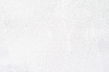 close up on white wall texture with unwanted detail on wall color.