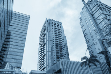 toned image of modern office skyscrapers