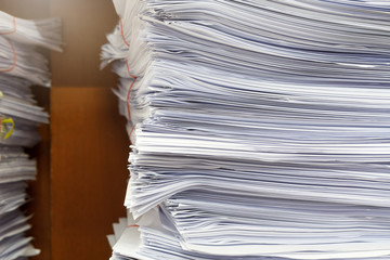 Close up of business documents stack on desk , report papers stack