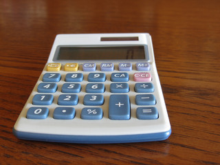 Solar calculator on a wooden table