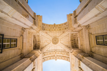 Obraz premium 10 July 2017 - Lisbon, Portugal. Lisbon, Portugal. Looking up at the iconic Augusta Street Triumphal Arch in the Commerce Square, Praca do Comercio or Terreiro do Paco.