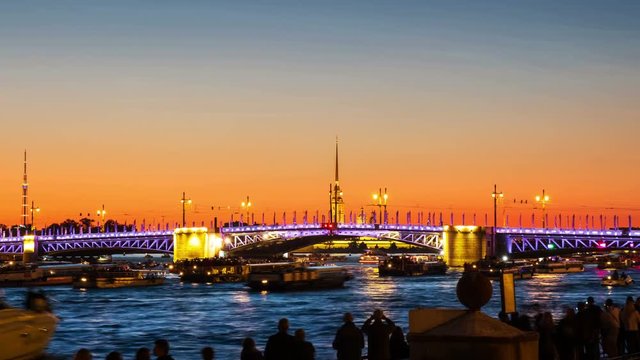 Saint Petersburg, Russia. The Opening of The Palace Bridge over the River Neva in St Petersburg, Russia. Time-lapse at sunset in summer