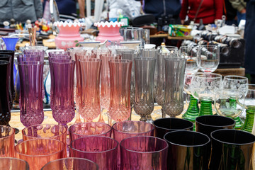 Old vintage kitchen utensils, glasses, plates, boilers, souvenirs, shots from the flea market