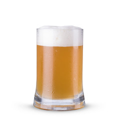 Light beer in a glass on a white background