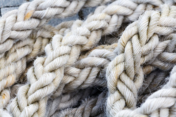 Gray nautical rope, closeup background texture