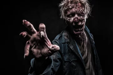 Fotobehang Bloody zombie man with brains out horror halloween © Yuliya Ochkan