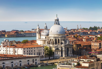 Fototapeta na wymiar Panoramic view on Venice and the Basilica Santa Maria della Salute from the bell tower of St. Mark's Cathedral, Italy