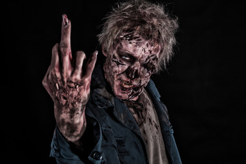 Bloody zombie man with brains out horror halloween