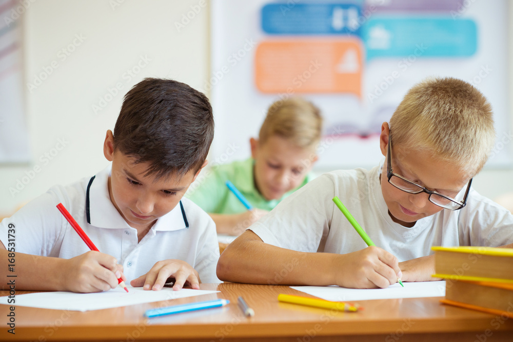 Wall mural Portrait of children in school